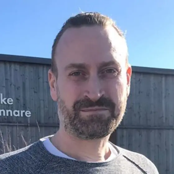 Porträttbild på Henrik Wahlman som arbetar inom biogasbranschen.