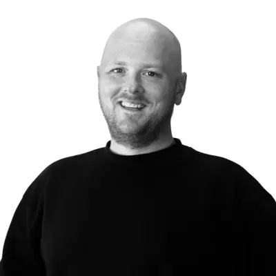 Porträttbild av Thom Rask